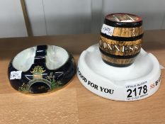 A Minton's Guinness barrel ashtray & a Carlton ware blue Royale stork ashtray