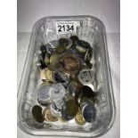 A box of assorted tokens