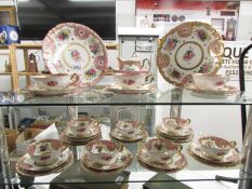An early 20th century Noritake Japanese tea set featuring fine quality hand painted gold encrusted