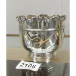 A small silver plant pot, hall marked for London, approximately 218 grams.(has small dints).