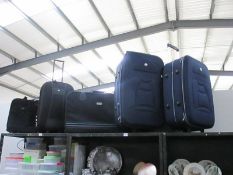 A quantity of luggage including 2 matching suitcases by Fiore