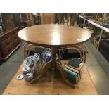 A solid oak tripod tea table