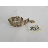 A 9ct gold bracelet with 9ct gold padlock, approximately 14 grams.