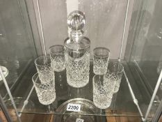 A crystal decanter & 6 crystal tumblers