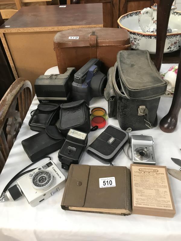 A good lot of cameras and cases etc.