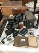 A good lot of cameras and cases etc.