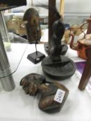 4 carved wood African items.