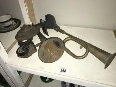 A vintage brass hooter car horn and 1 other