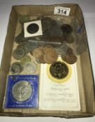 A quantity of coins including Queen mother £5 coin and approx. 46 g of pre 1947 silver coins etc.