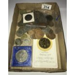 A quantity of coins including Queen mother £5 coin and approx. 46 g of pre 1947 silver coins etc.