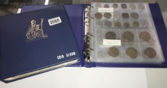 2 albums of English and foreign coins