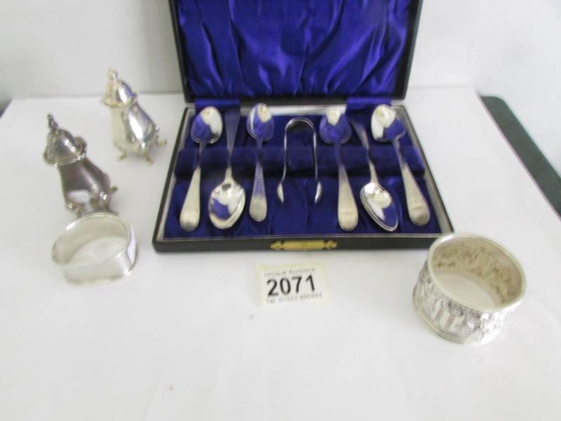 A cased set of 6 silver teaspoon with sugar nips (spoons hall marked C.H.