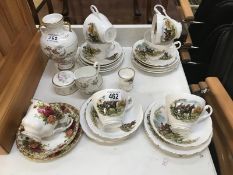 A mixed lot including Springfield hunting scenes tea set, Old Country Rose tea cup and saucer etc.