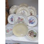 A collection of ribbon plates and collectors plates