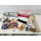 A mixed lot of vintage costume jewellery and vintage jewellery boxes.