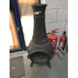 A cast iron chiminea ****Condition report**** Approximately 96cm tall In sound