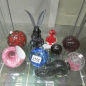 A good lot of glass paperweights including Rabbit.