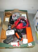 A box of misc. items including calculators, cameras, bibles etc.