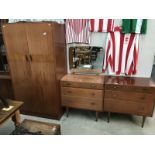 A 3 piece 1950's bedroom suite by CWS Ltd, Enfield, consisting of double wardrobe,