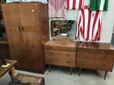 A 3 piece 1950's bedroom suite by CWS Ltd, Enfield, consisting of double wardrobe,