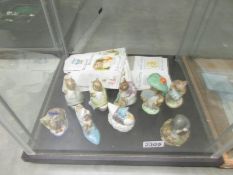 7 Beswick Beatrix Potter figurines and 2 Royal Albert Beatrix Potter figurines together with 7