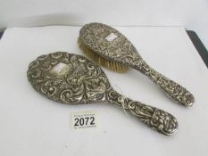 A silver hand mirror hall marked Walker & Hall,