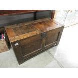 An oak blanket box.