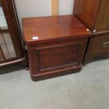 An old mahogany commode (missing pot).