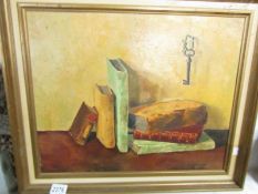 A Dutch still life oil on board study of books signed R Adriaange, image 48 x 39 cm.