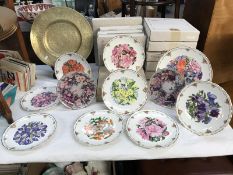11 boxed collectors plates including Royal Albert & Bradford Exchange & brass plate