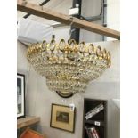 A large gilded brass basket chandelier with glass droppers ****Condition report****