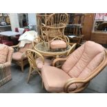 A large set of conservatory furniture, consisting of a swivel chair, table and 4 chairs,