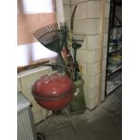 A Weber BBQ & a sunshade plus a large amount of garden tools with chimney pot
