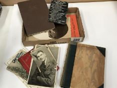 A small box containing military photos, etc.