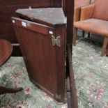 A Victorian mahogany corner cupboard.