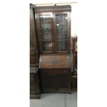 A 1930's oak bureau bookcase with leaded glass panels ****Condition report**** Top