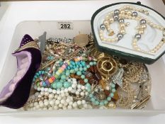 A tray of costume jewellery including pearls