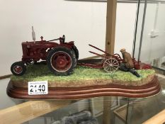A Border Fine arts model of a tractor & plough