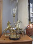 A solid brass rearing horse table lamp