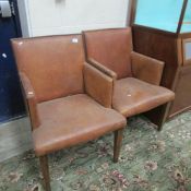 A set of 4 leather office chairs.