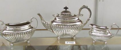 A 3 piece silver tea set comprising teapot, sugar bowl and milk jug,