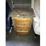 A shabby chic bedroom chest of drawers
