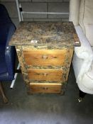 A shabby chic bedroom chest of drawers