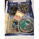A large quantity of assorted costume jewellery including rings, bangles & necklaces etc.