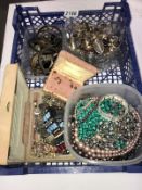 A large quantity of assorted costume jewellery including rings, bangles & necklaces etc.