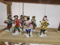 A set of 7 'Monkey Band' figurines.