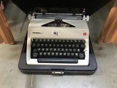 An Olympia SM8 typewriter in case
