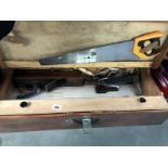 A carpenters chest with tools