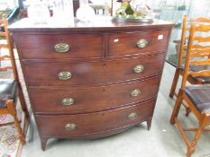 A good quality Victorian mahogany 2 over 3 bow front chest of drawers.