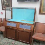 An old mahogany shop display cabinet.